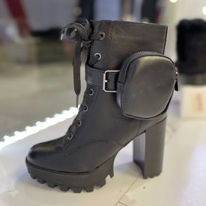 Black boots with zip up bag